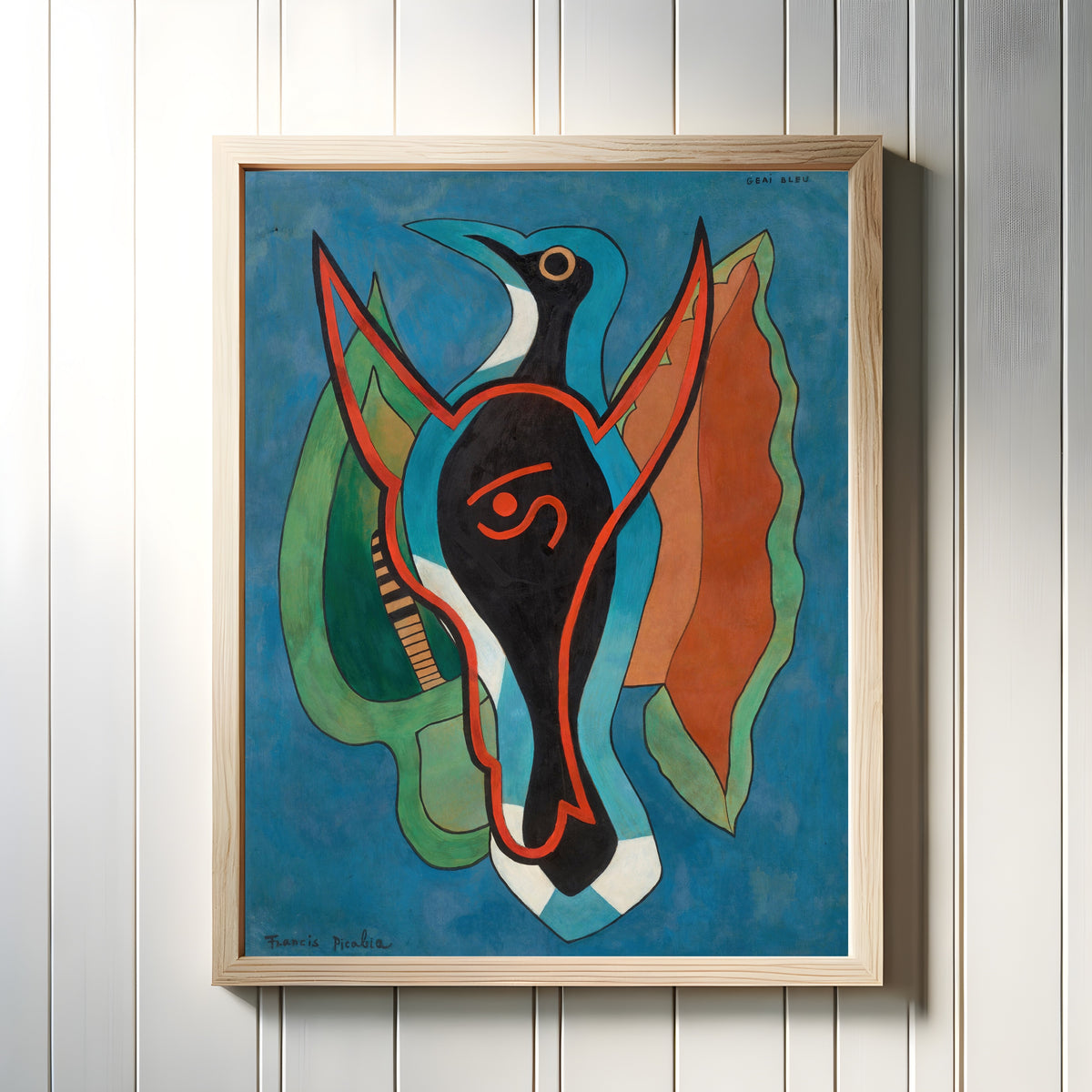 Framed art print of Geai bleu by Francis Picabia, in a light wood frame on a white panelled wall