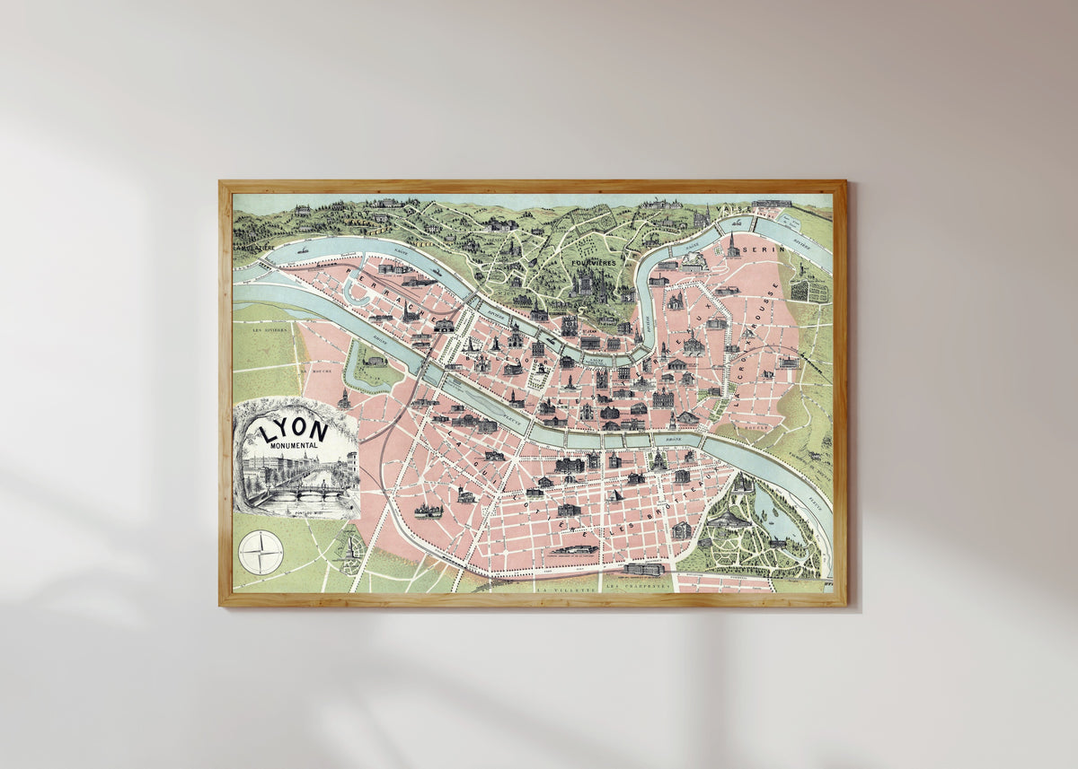 Framed art print of Lyon Monumental by Garnier Frères, in a light wood frame on a sunlit white wall
