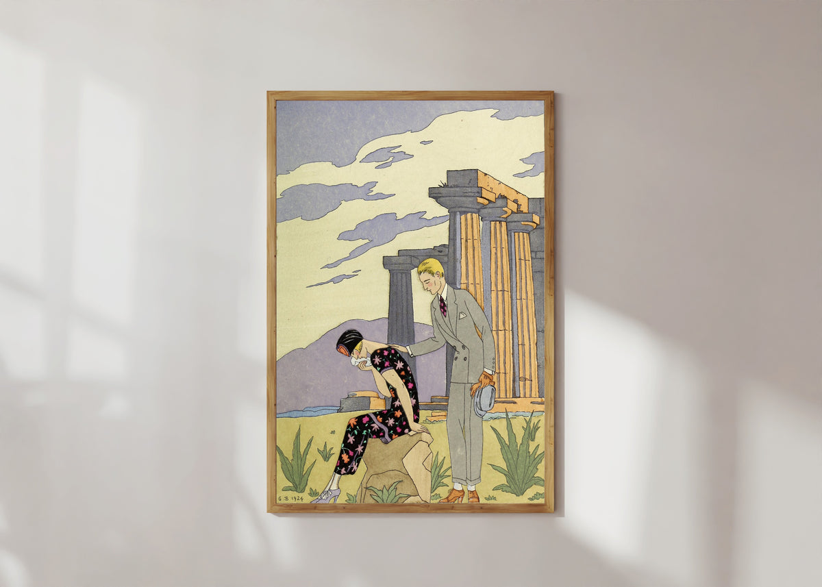 Framed art print of Falbalas et Fanfreluches: Paestum by George Barbier, in a light wood frame on a sunlit white wall