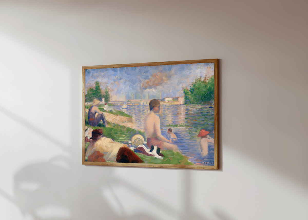Framed art print of Final Study for Bathers at Asnieres by Georges Seurat, in a light wood frame on a sunlit white wall, seen at a slight angle