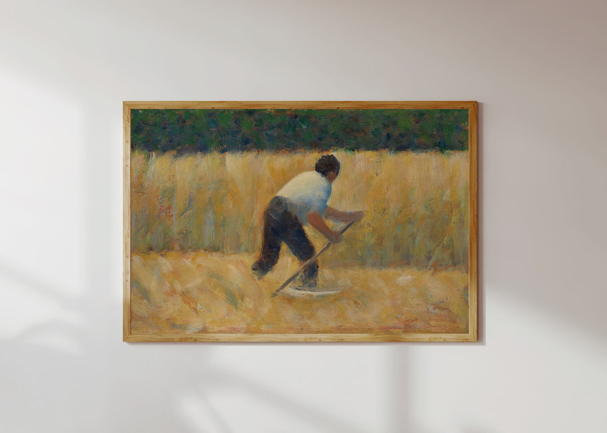 Framed art print of The Mower by Georges Seurat, in a light wood frame on a sunlit white wall