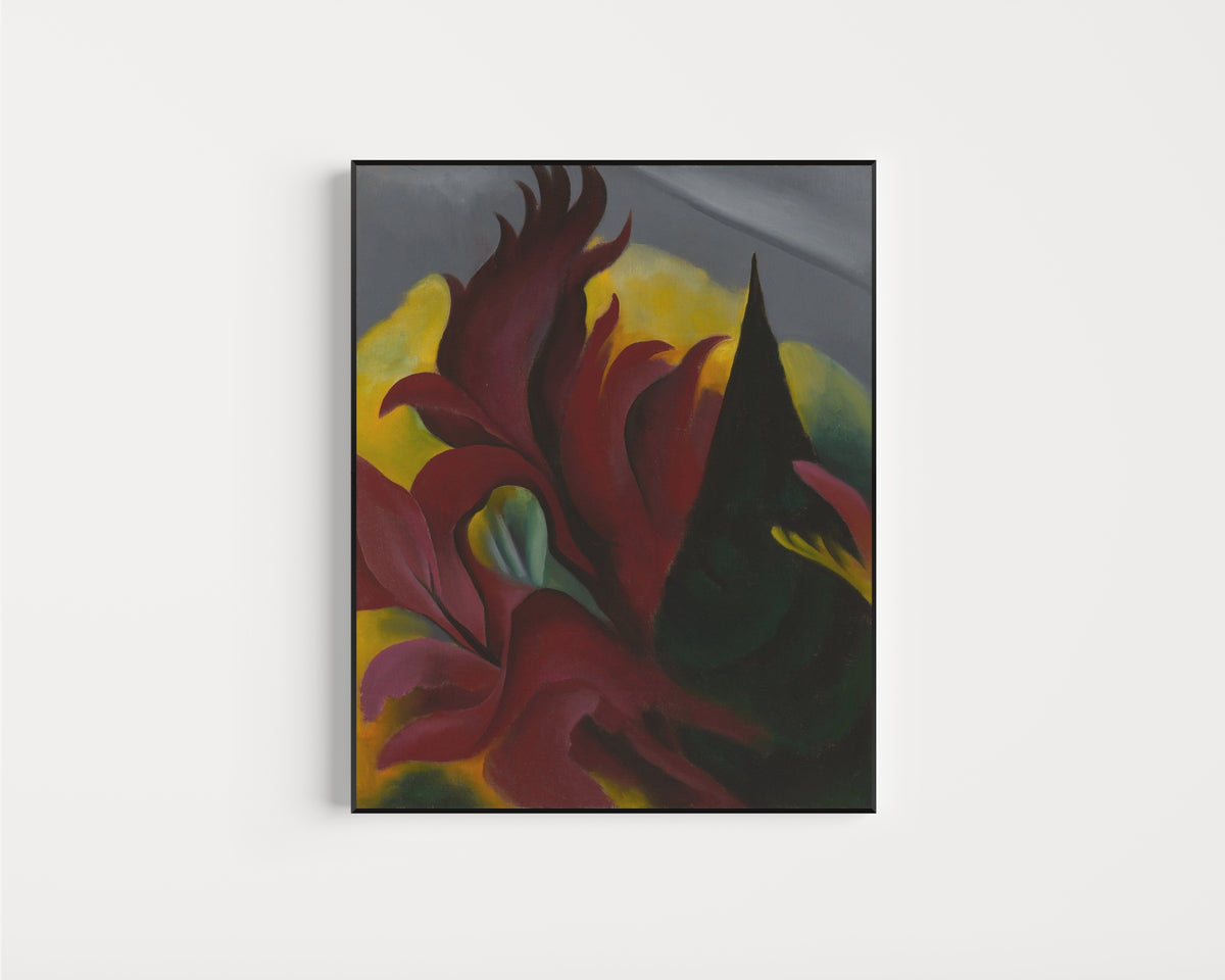 Framed art print of Red Maple by Georgia O'Keeffe, in a slim black frame on a plain white wall