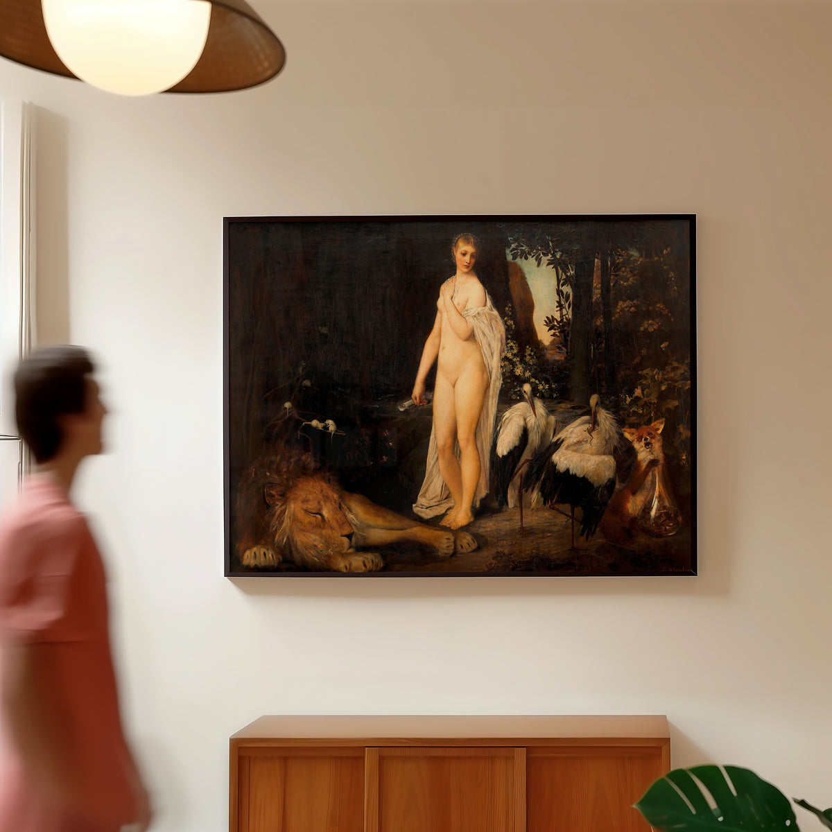 Framed art print of Fable (Fabel) by Gustav Klimt, in a slim black frame on a warm wall in a sunlit room