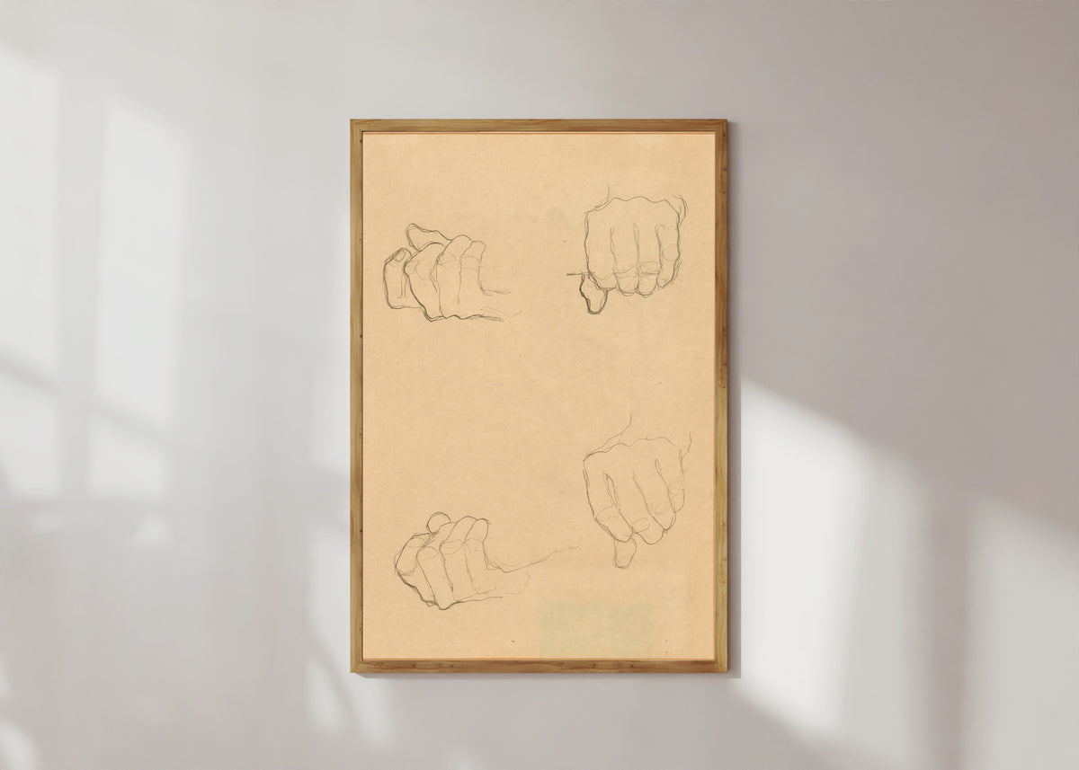 Framed art print of Study of Hands by Gustav Klimt, in a light wood frame on a sunlit white wall