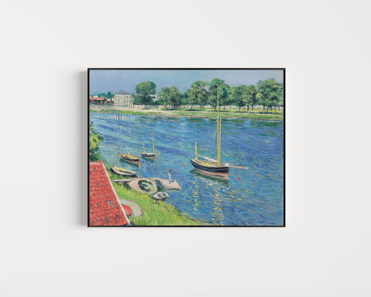 Framed art print of La Seine à Argenteuil, bateaux au mouillage by Gustave Caillebotte, in a slim black frame on a plain white wall