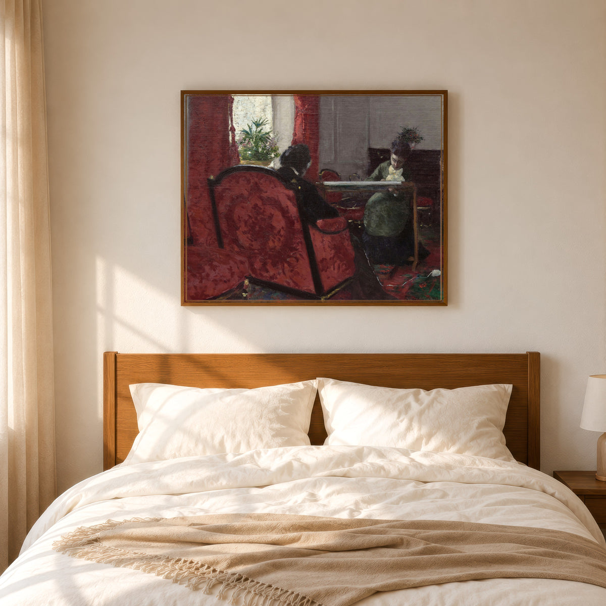 Framed art print of Portraits dans un intérieur (Portraits in an Interior) by Gustave Caillebotte, in a slim wood frame above a bed in a sunlit bedroom