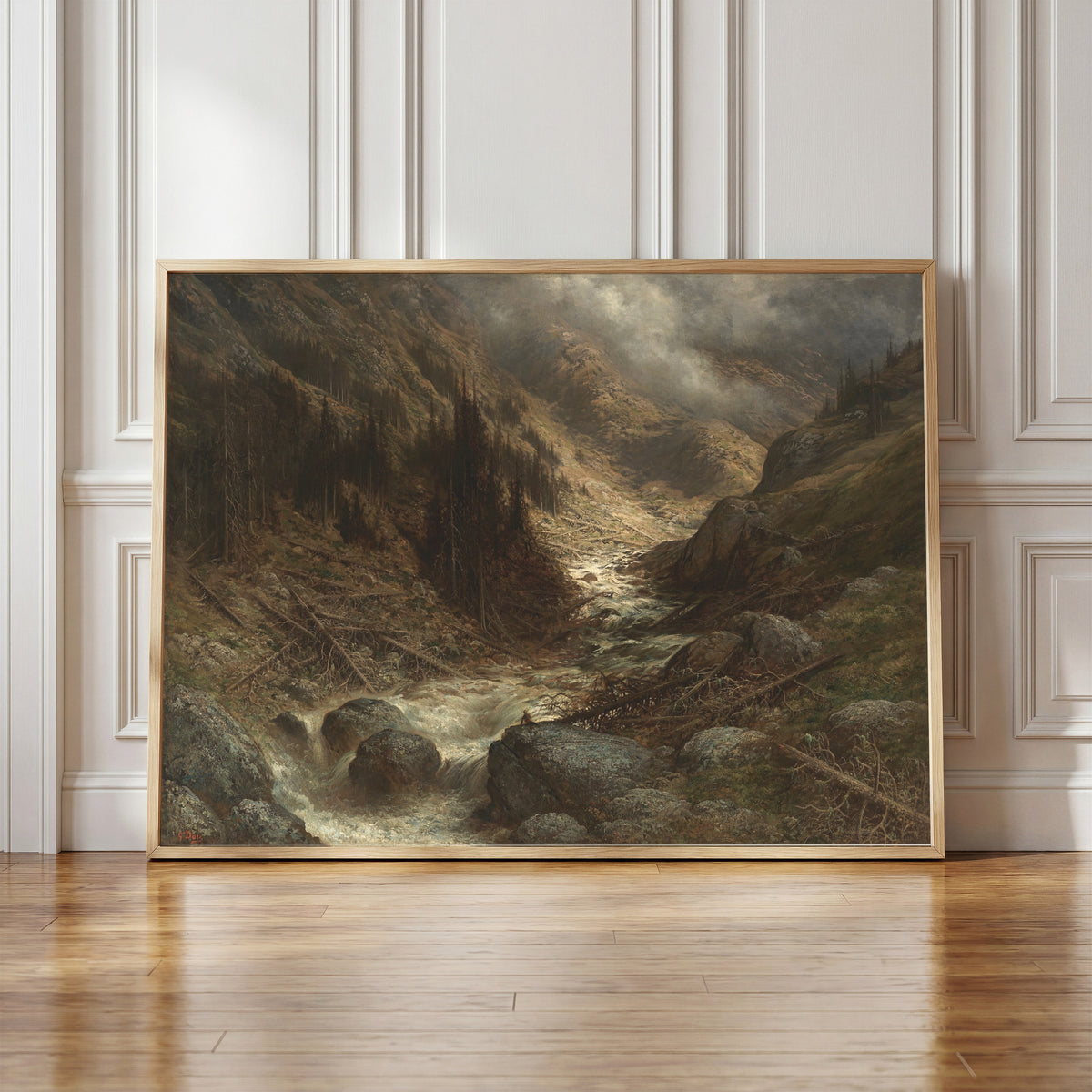 Framed art print of A Torrent in the Engadine by Gustave Doré, in a light wood frame leaning against a panelled white wall