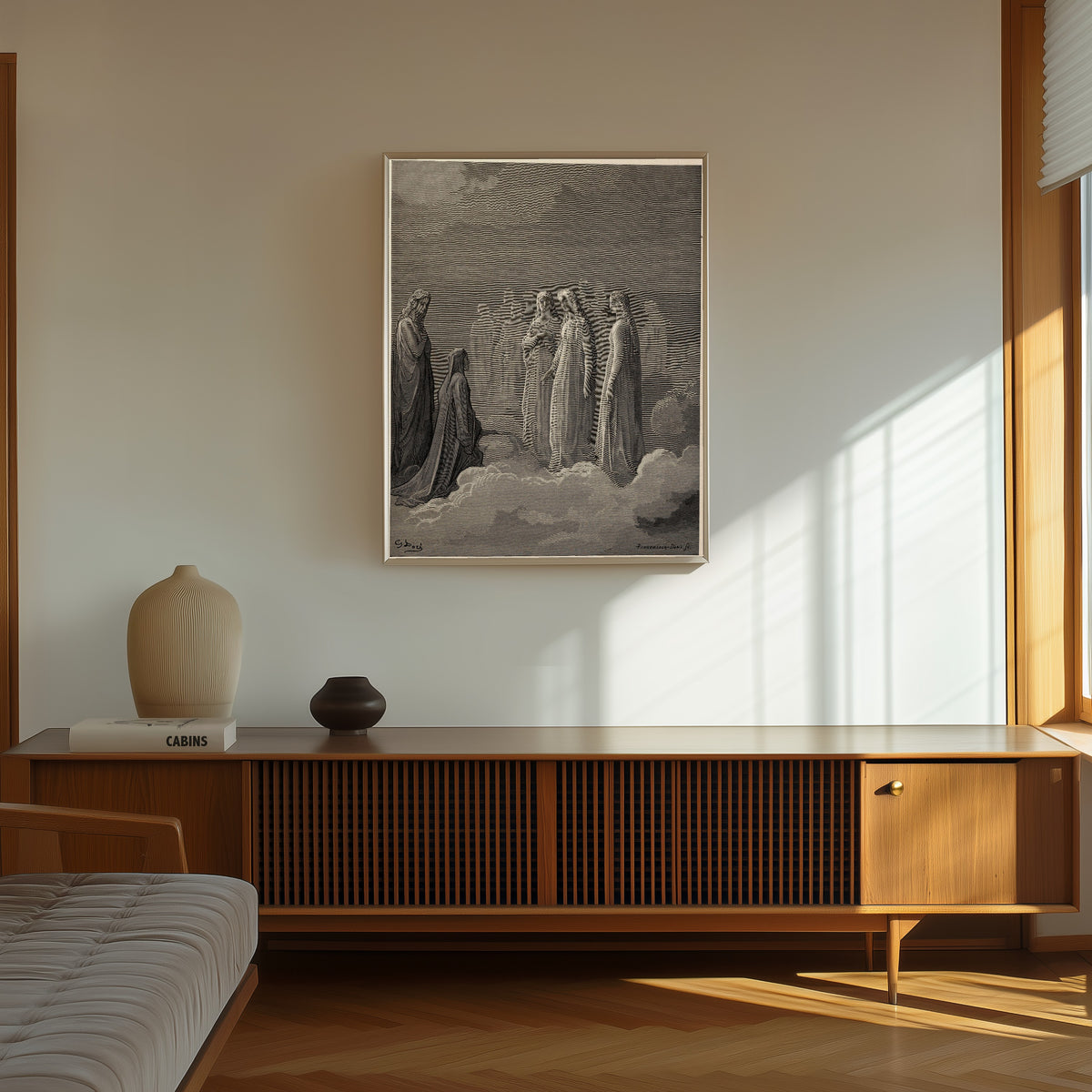 Framed art print of Paradiso, Canto III: Piccarda and the Souls in the Moon by Gustave Doré, in a thin light frame on a sunlit wall above a wooden sideboard