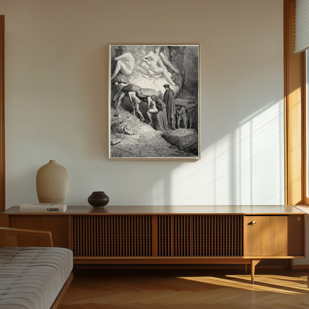 Framed art print of Purgatorio, Canto XII: Oxen in the Yoke by Gustave Doré, in a thin light frame on a sunlit wall above a wooden sideboard