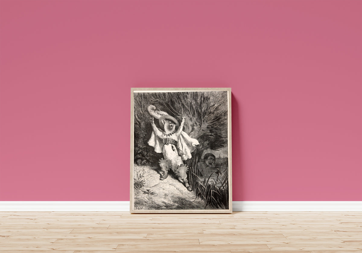 Framed art print of Puss in Boots: The Marquis of Carabas Is Drowning by Gustave Doré, in a light wood frame leaning on a pink wall above a wooden floor