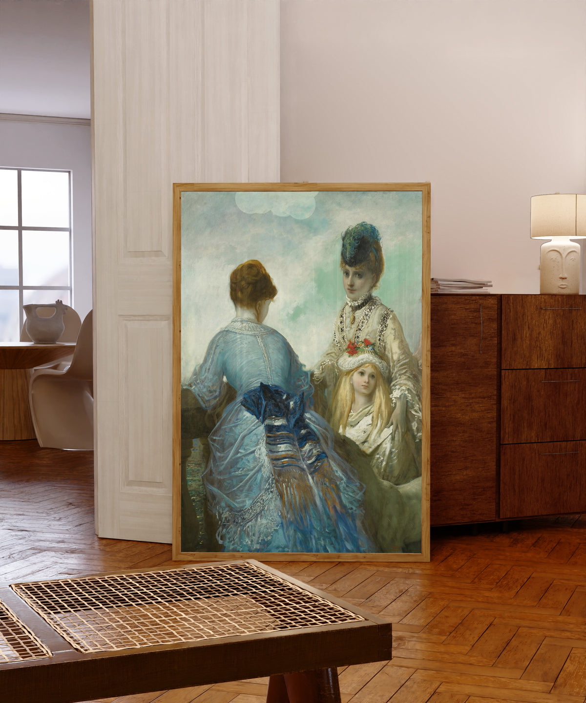 Framed art print of The Promenade (La promenade) by Gustave Doré, in a light wood frame leaning in a warm room with a parquet floor