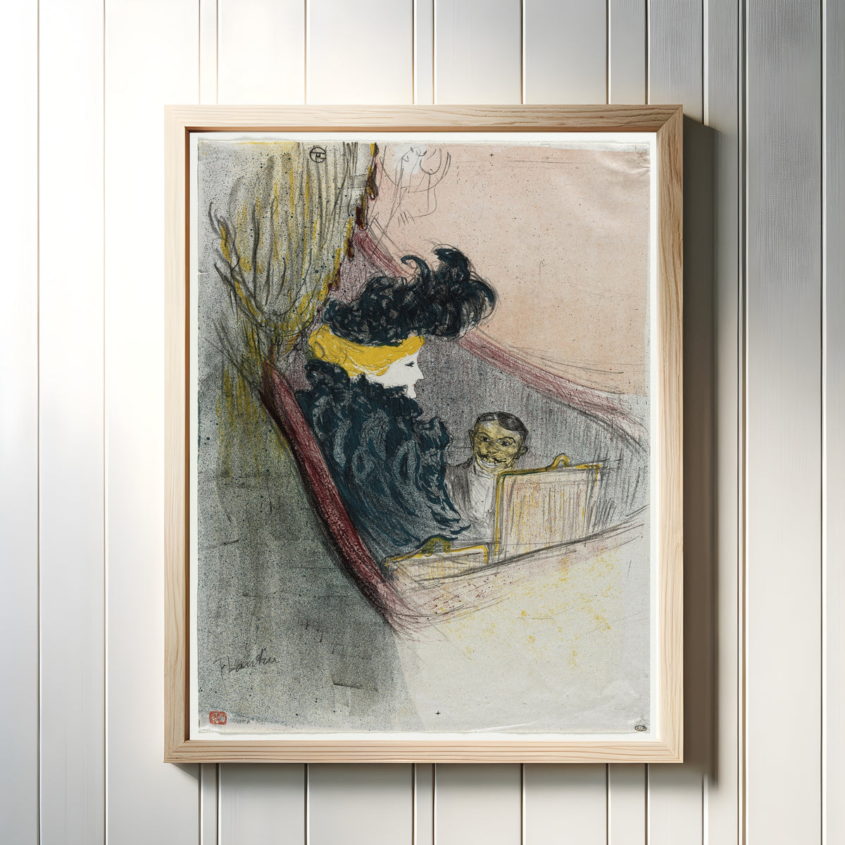 Framed art print of A Princely Idyl, Clara Ward by Henri de Toulouse-Lautrec, in a light wood frame on a white panelled wall