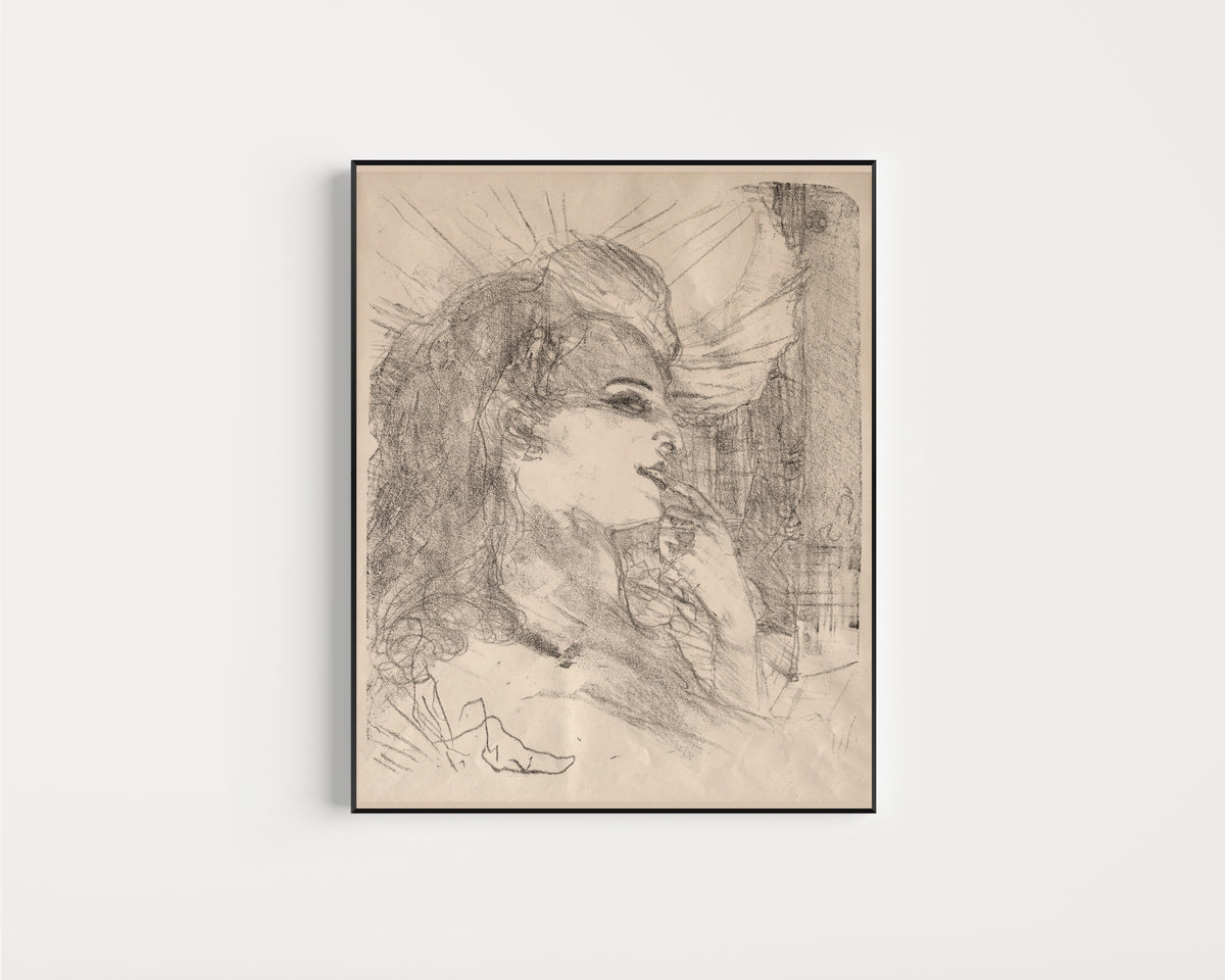 Framed art print of Anna Held by Henri de Toulouse-Lautrec, in a slim black frame on a plain white wall