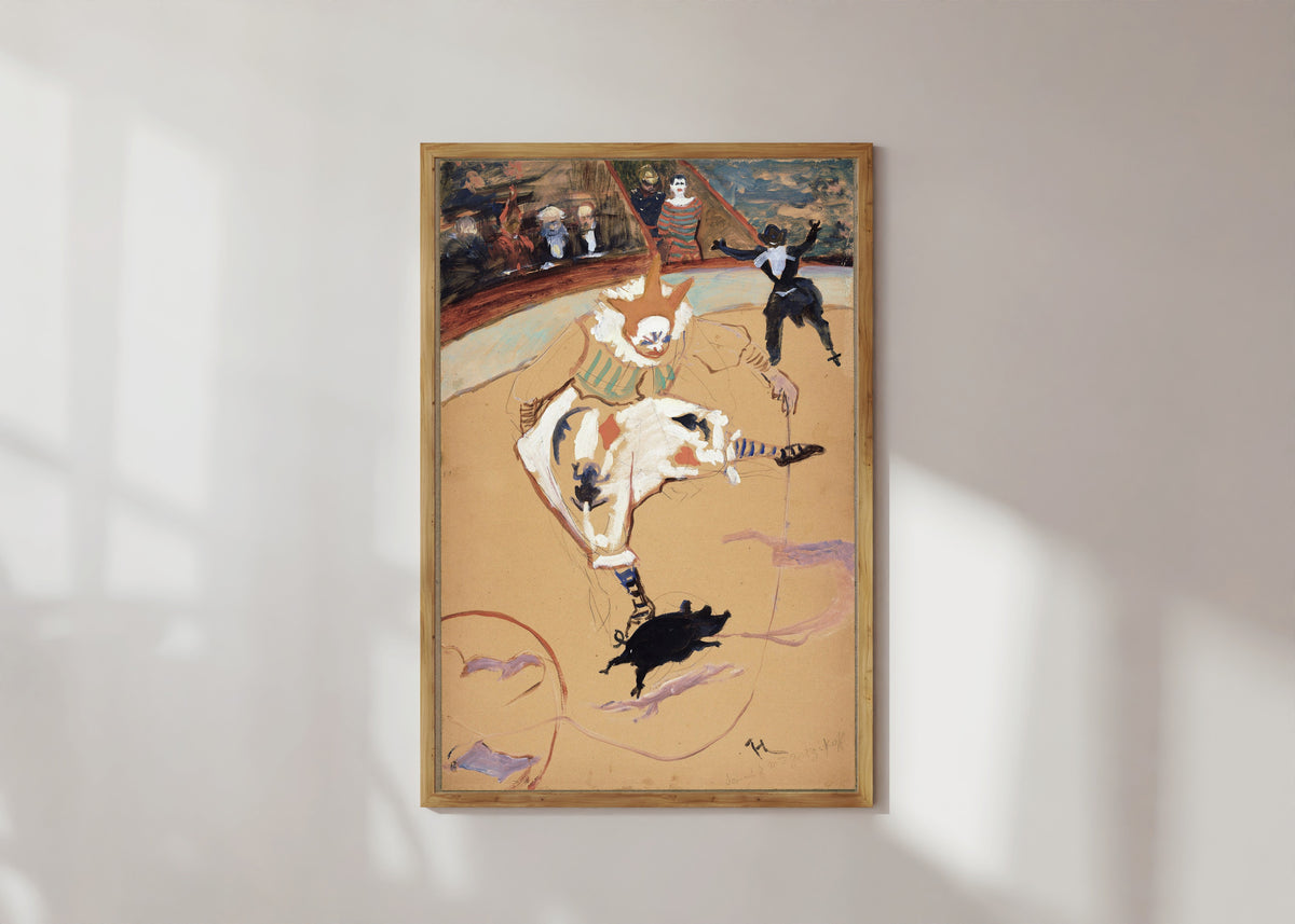 Framed art print of At the Circus Fernando: Medrano with a Piglet by Henri de Toulouse-Lautrec, in a light wood frame on a sunlit white wall
