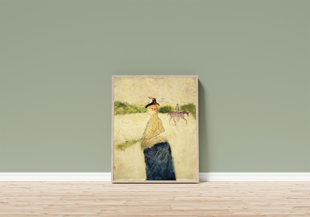 Framed art print of Émilie by Henri de Toulouse-Lautrec, in a light wood frame leaning on a sage green wall above a wooden floor