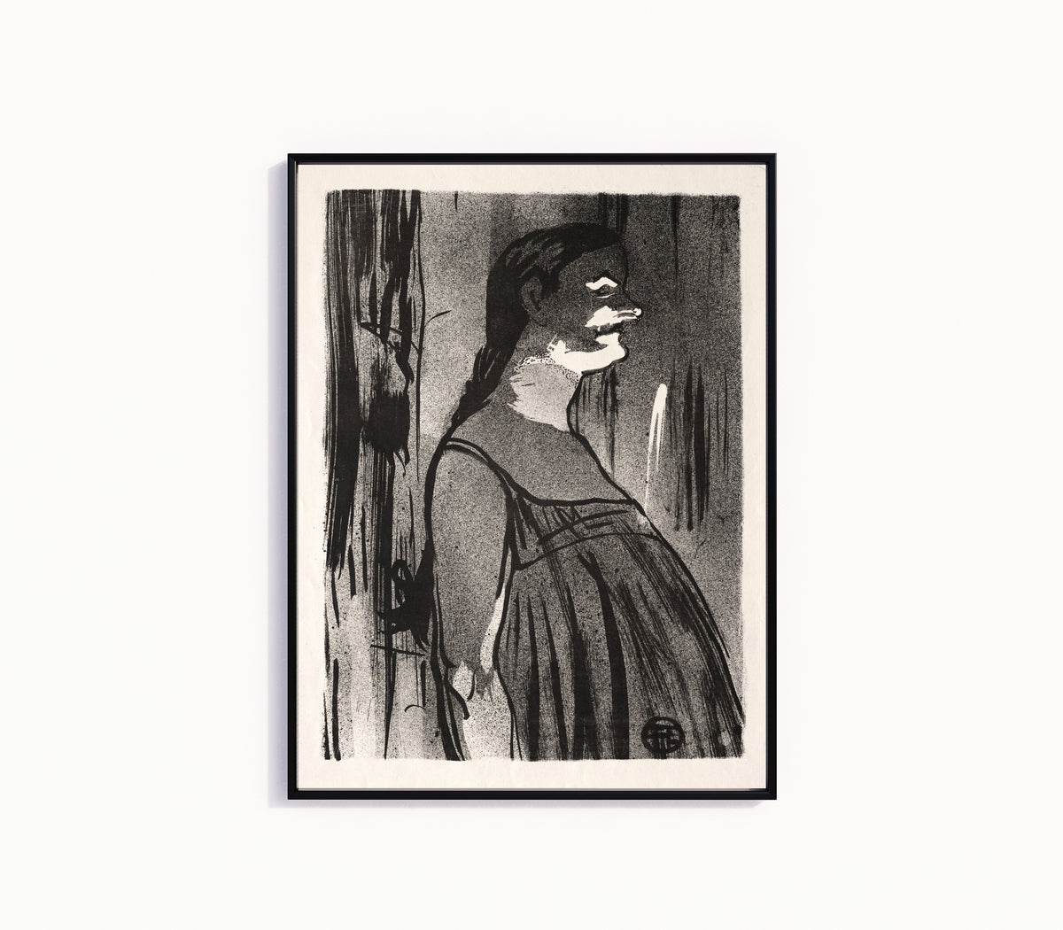 Framed art print of Le Café-Concert: Mme. Abdala by Henri de Toulouse-Lautrec, in a slim black frame on a plain white wall