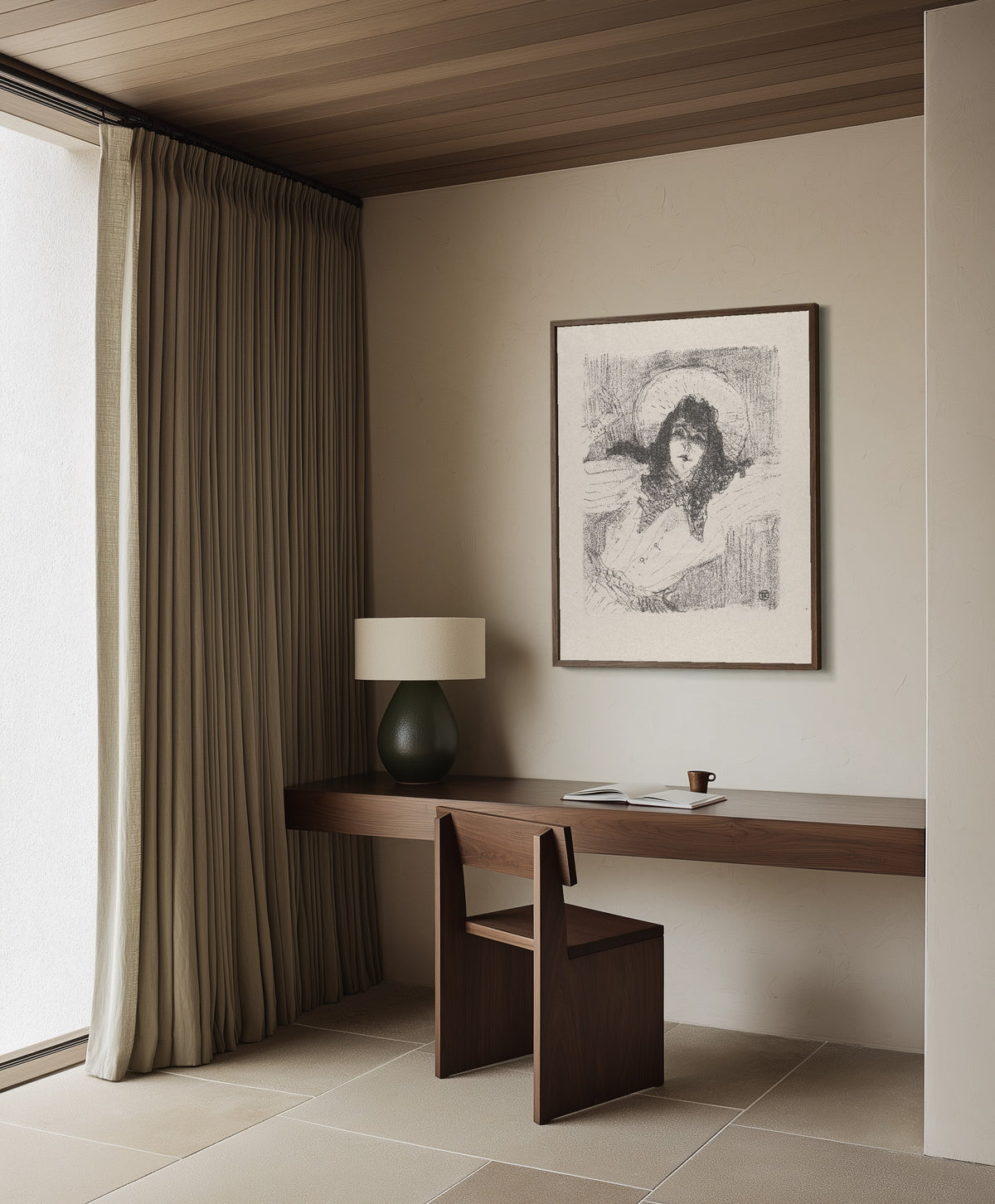 Framed art print of May Belfort (Bust Portrait) by Henri de Toulouse-Lautrec, in a dark wood frame on a plaster wall above a walnut desk