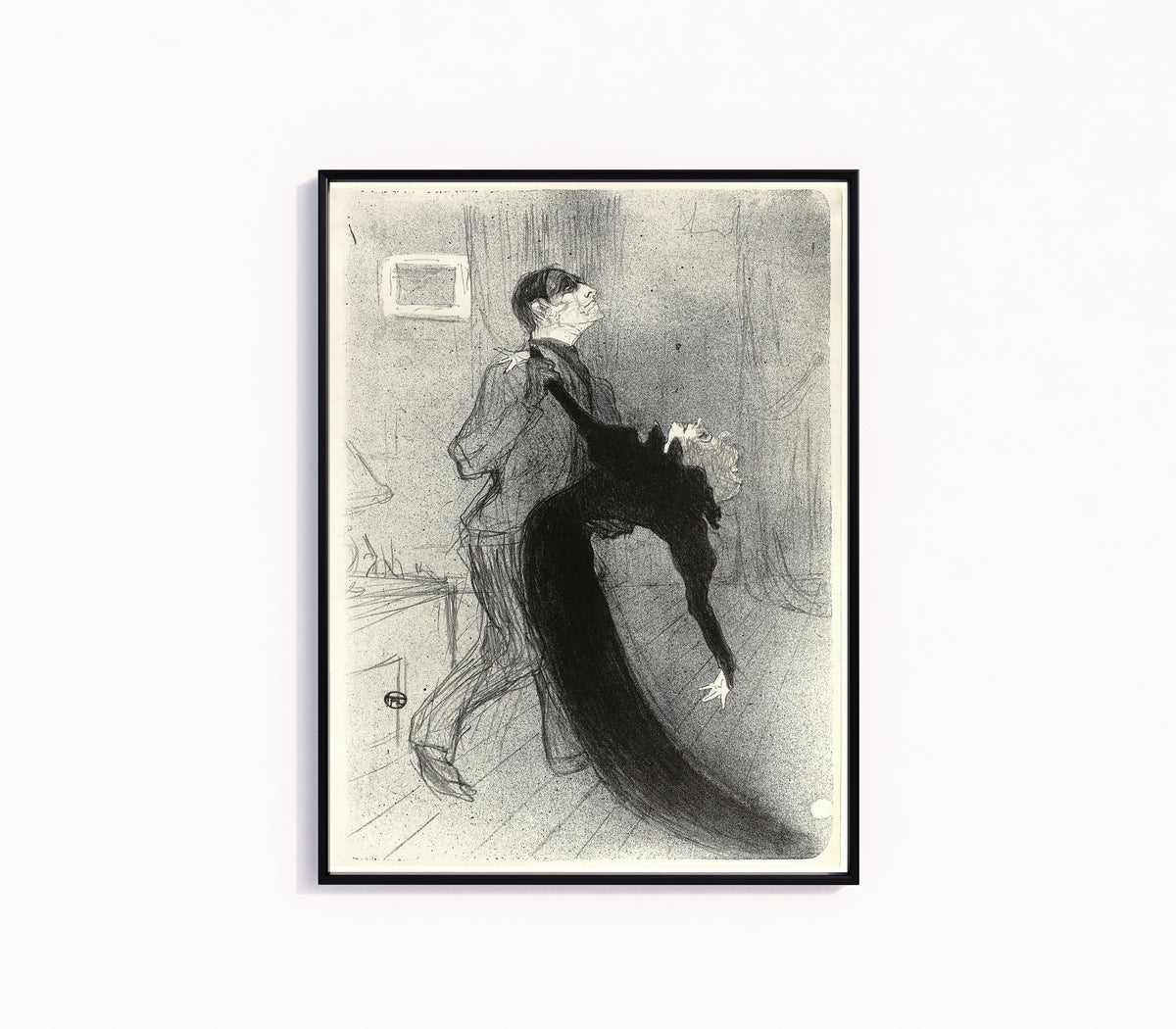 Framed art print of The Fainting Fit by Henri de Toulouse-Lautrec, in a slim black frame on a plain white wall
