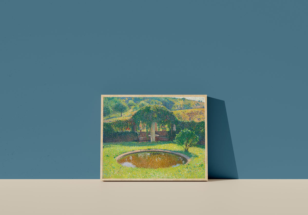 Framed art print of Bassin et tonnelle sud-ouest du parc de Marquayrol by Henri Martin, in a light wood frame leaning on a blue wall
