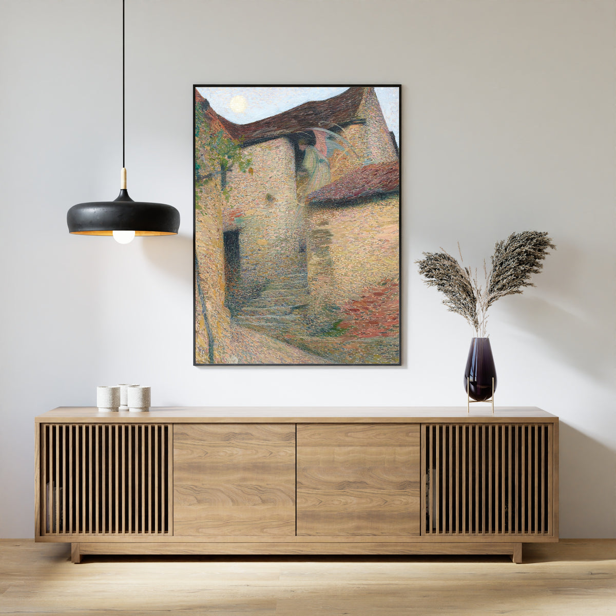 Framed art print of Charité by Henri Martin, above a slatted wood sideboard