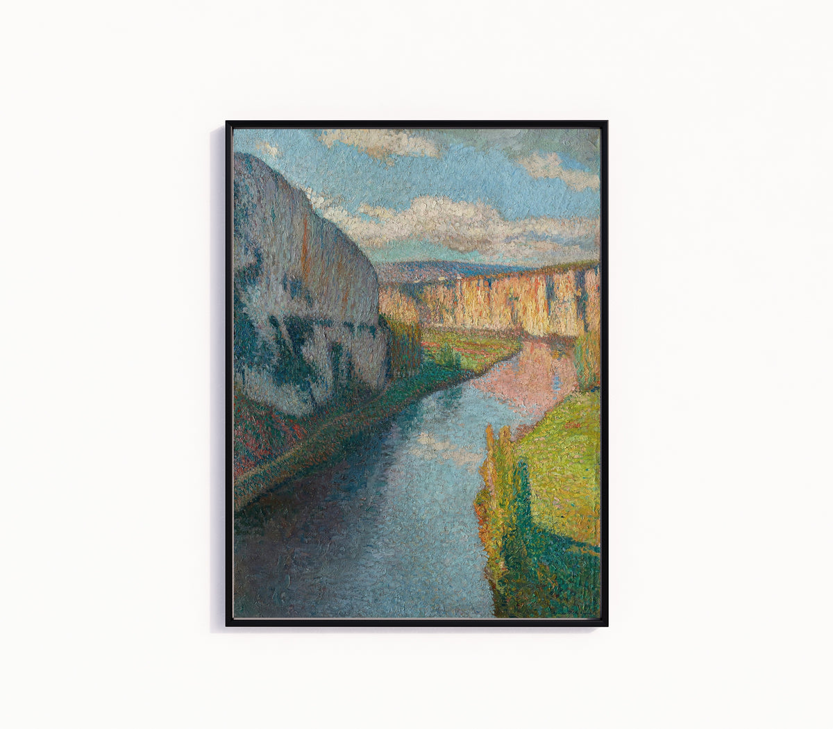 Framed art print of La Vallée du Lot, près de Saint-Cirq-Lapopie (Clouds over the Cliffs) by Henri Martin, in a slim black frame on a plain white wall