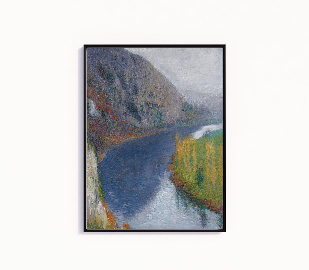 Framed art print of Le Lot au pied des falaises de St-Cirq-Lapopie (Pale Grey Sky) by Henri Martin, in a slim black frame on a plain white wall