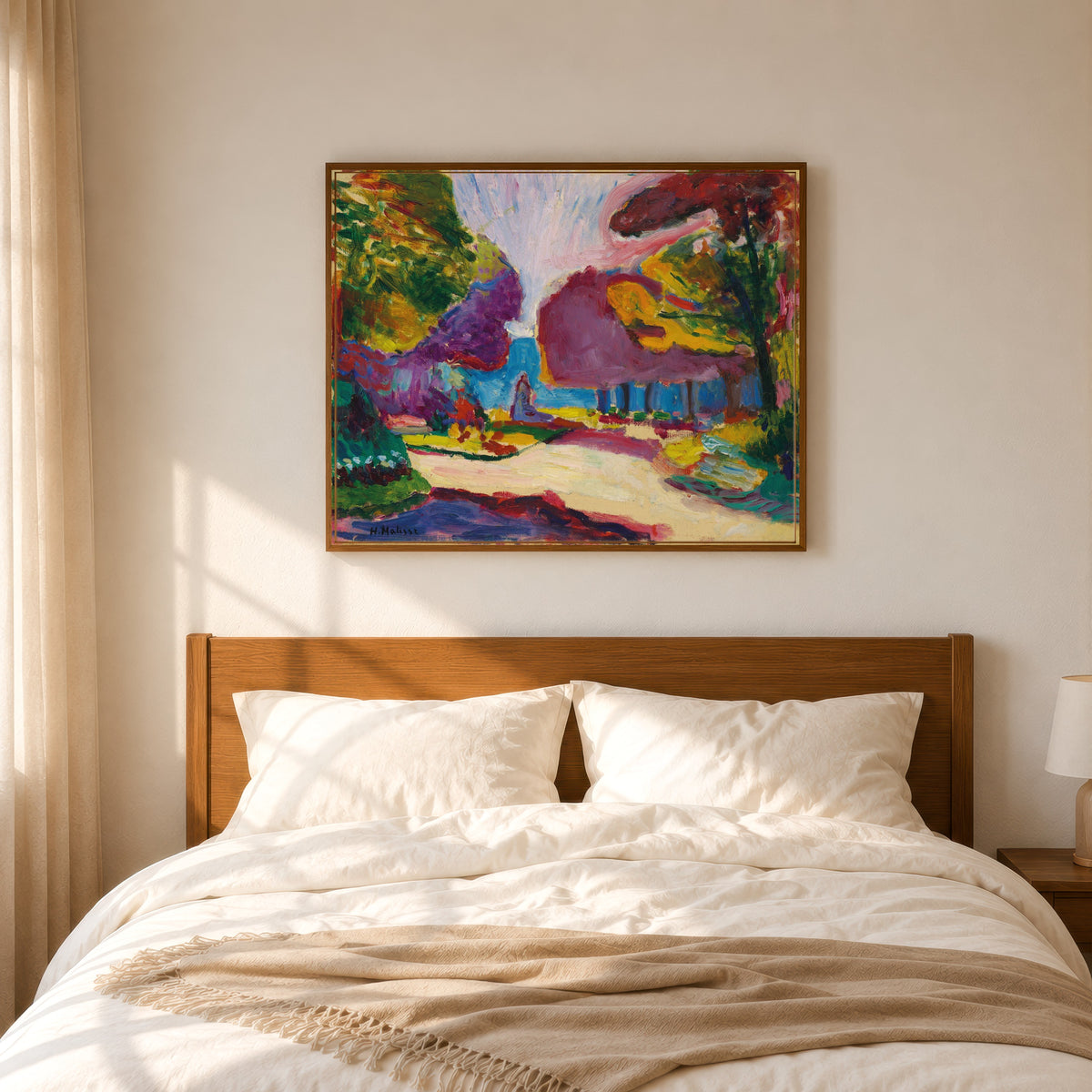Framed art print of Jardin du Luxembourg, Paris by Henri Matisse, in a slim wood frame above a bed in a sunlit bedroom