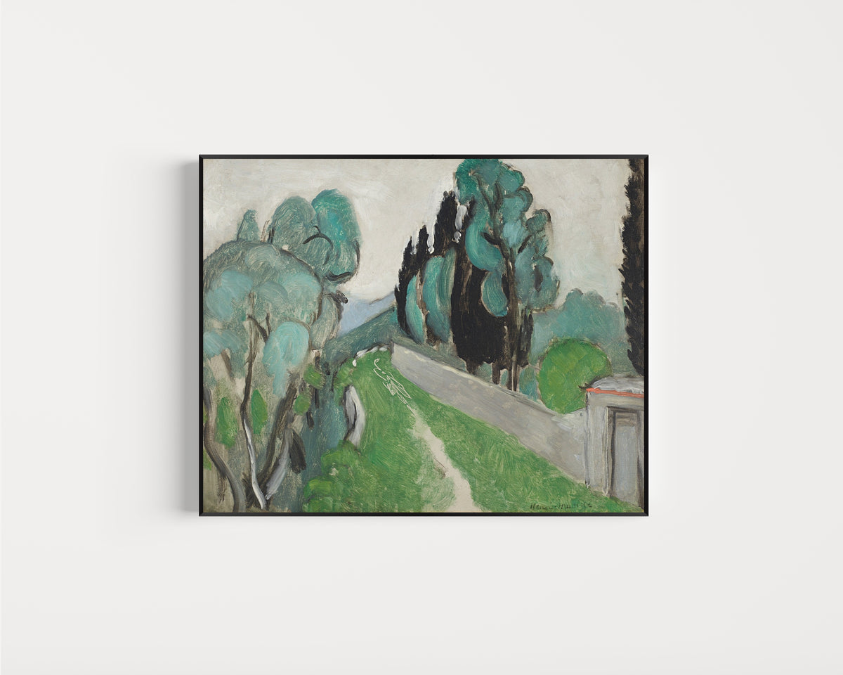 Framed art print of Landscape with Cypresses and Olive Trees near Nice by Henri Matisse, in a slim black frame on a plain white wall