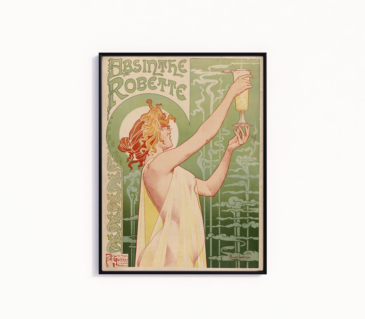 Framed art print of Absinthe Robette by Henri Privat-Livemont, in a slim black frame on a plain white wall
