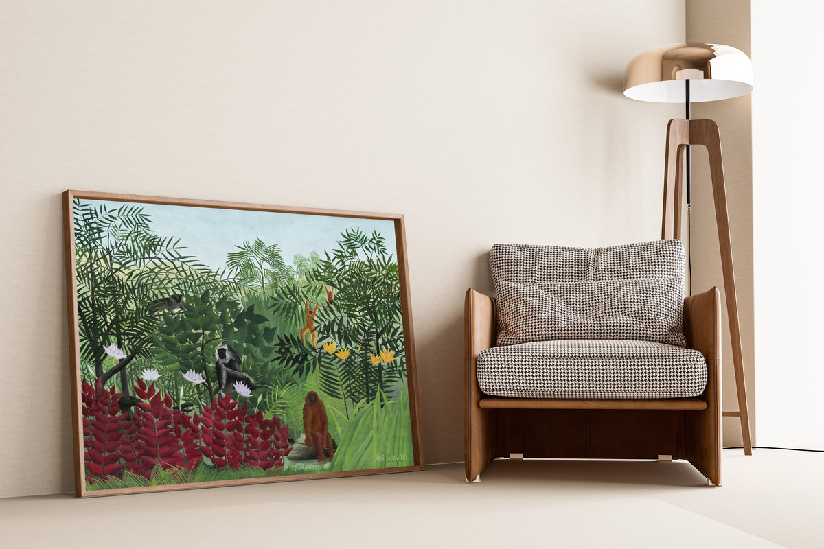 Tropical Forest with Monkeys by Henri Rousseau — framed and leaning against a wall beside an armchair and a floor lamp