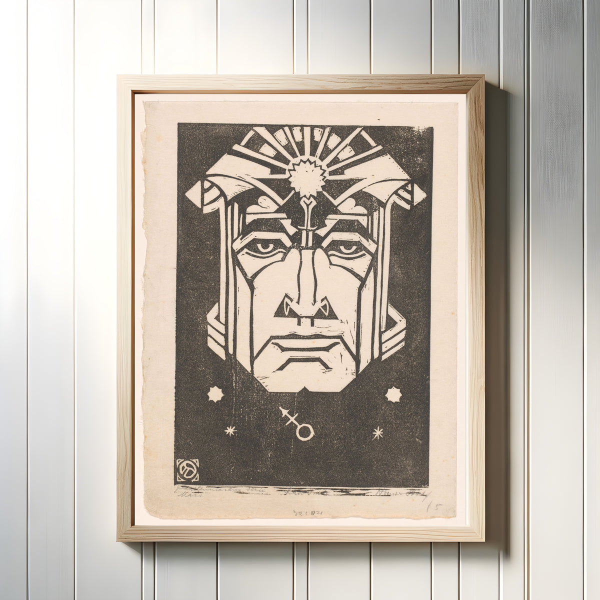 Framed art print of Mars by Henri van der Stok, in a light wood frame on a white panelled wall