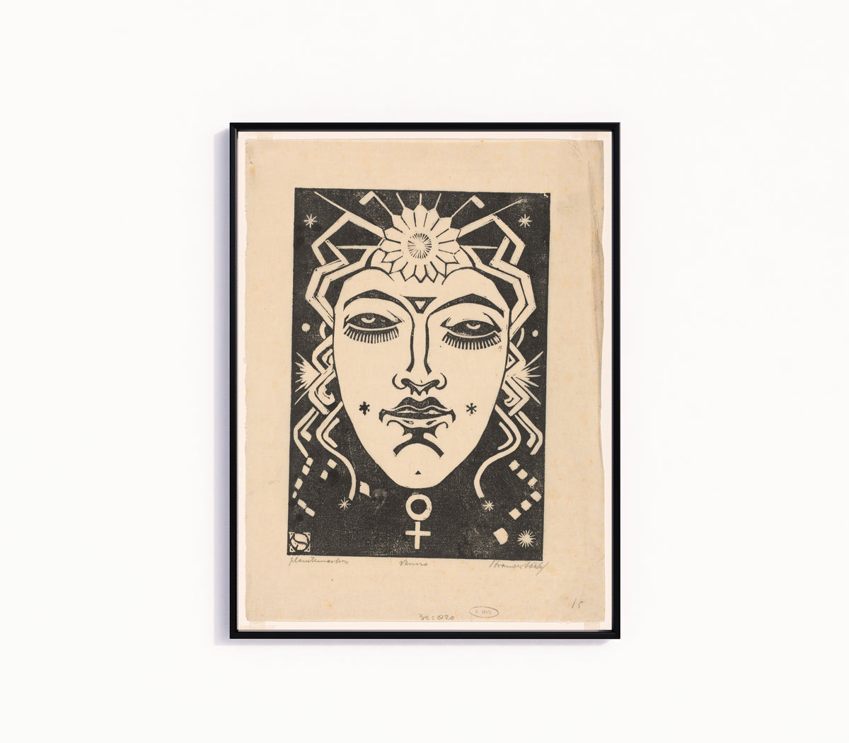 Framed art print of Venus by Henri van der Stok, in a slim black frame on a plain white wall
