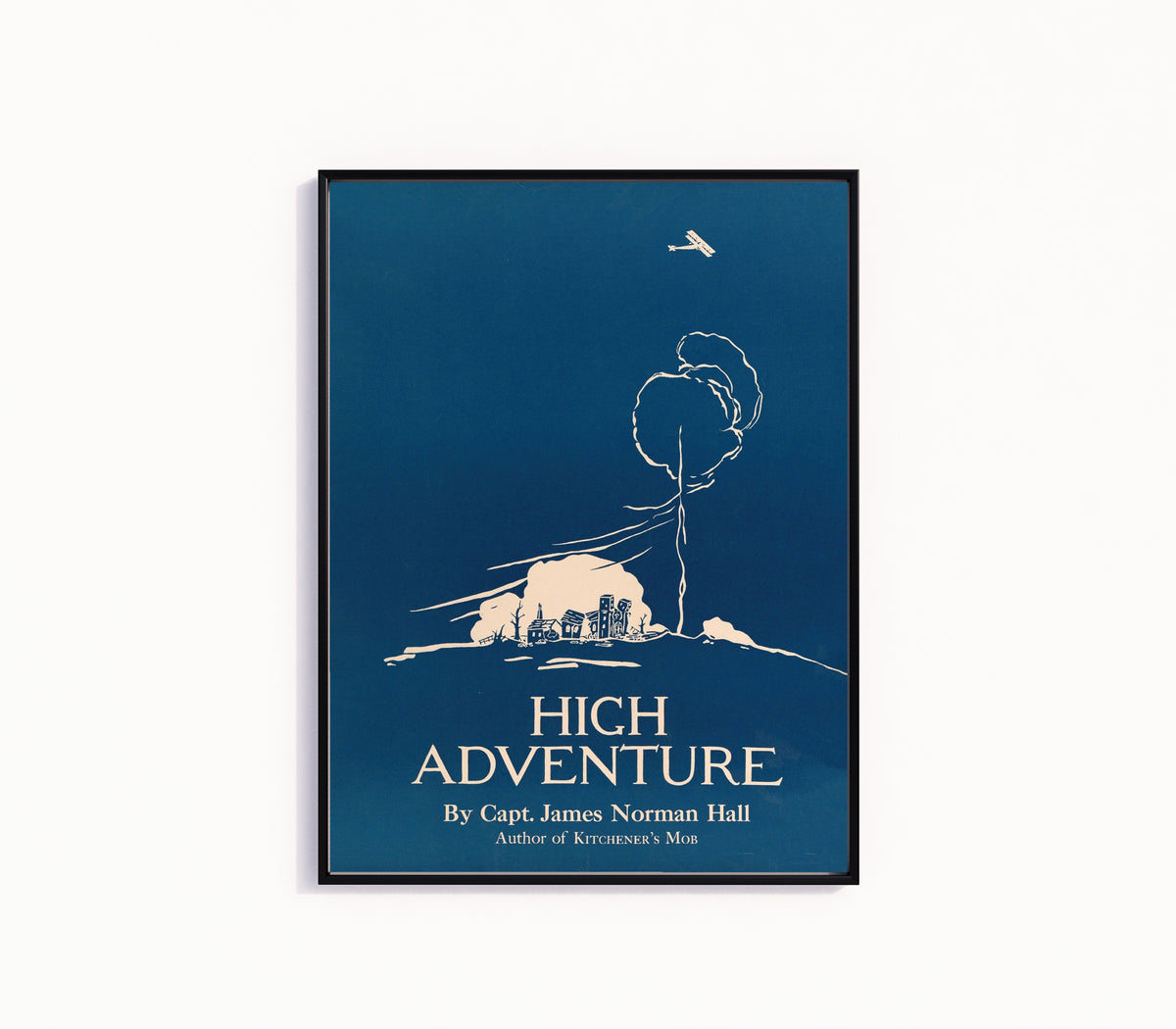Framed art print of High Adventure by Edward Penfield, in a slim black frame on a plain white wall