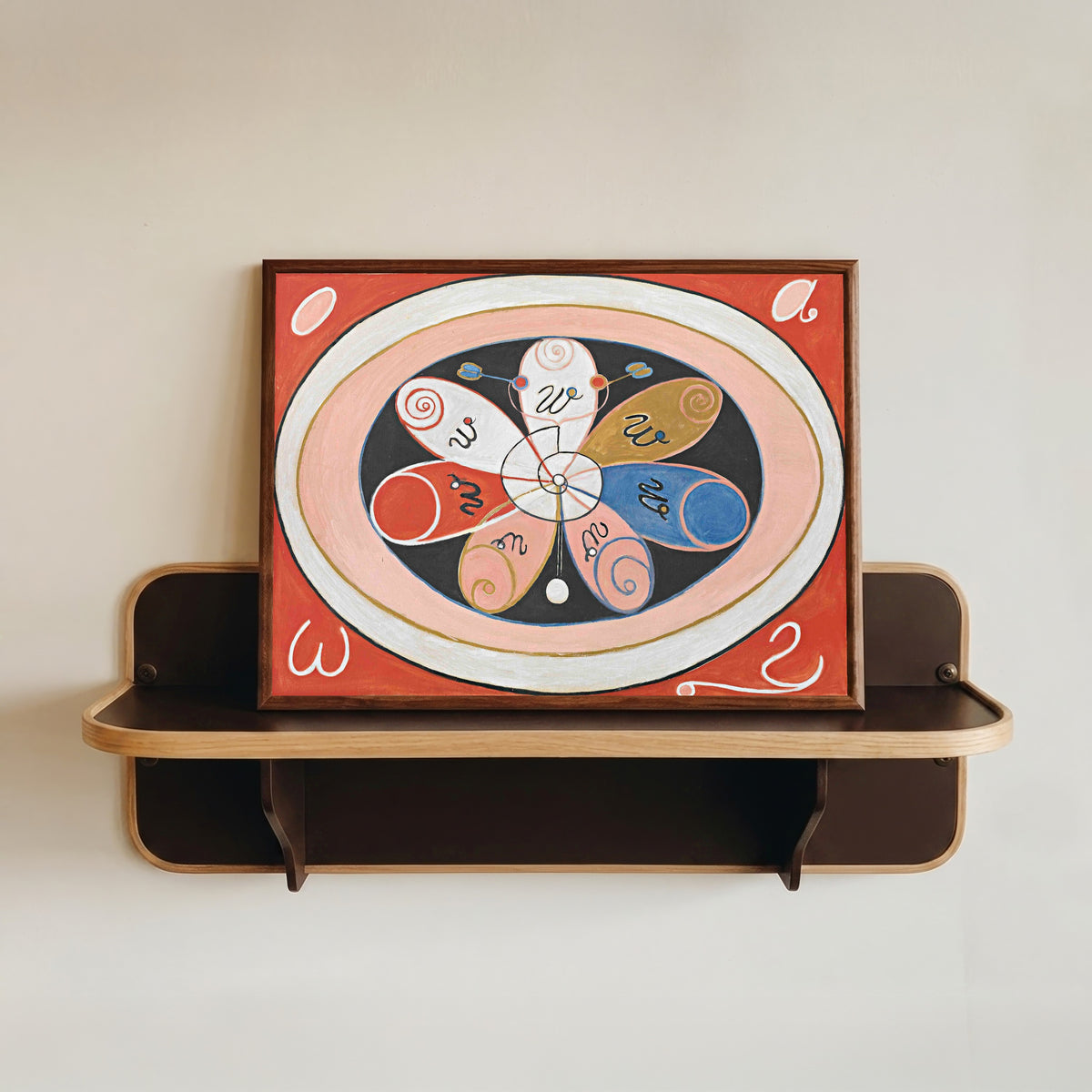 Framed art print of Evolution, No. 15, Group IV, The Seven-pointed Stars by Hilma af Klint, in a dark wood frame resting on a wall shelf