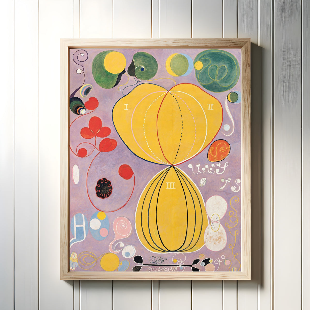 Framed art print of The Ten Largest, No. 7, Adulthood by Hilma af Klint, in a light wood frame on a white panelled wall