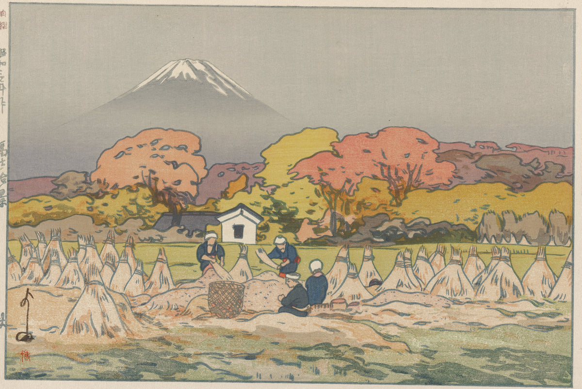 Autumn by Hiroshi Yoshida — Fuji over autumn trees and a harvest field of conical stacks