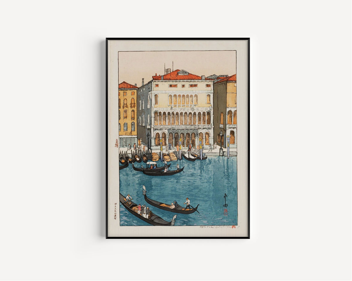 Framed art print of Canal in Venice by Hiroshi Yoshida, in a slim black frame on a plain white wall