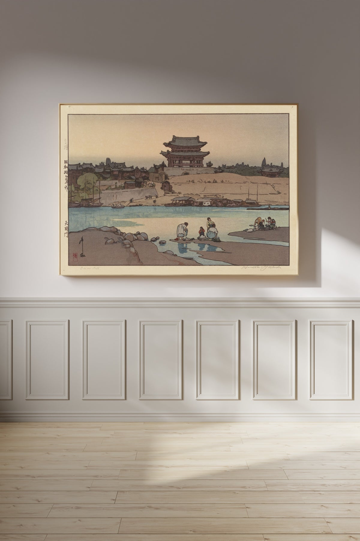Framed art print of Daidomon (Taedong Gate), Pyongyang by Hiroshi Yoshida, on a panelled wall in afternoon light