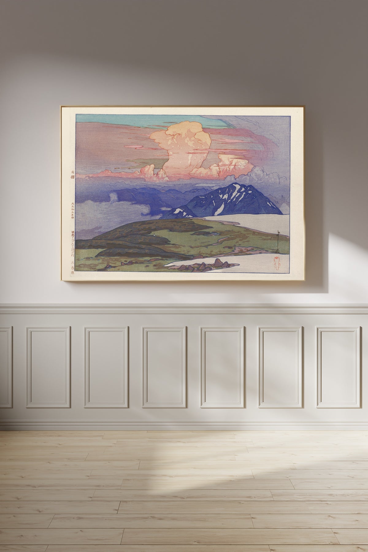 Framed art print of Goshikigahara by Hiroshi Yoshida, on a panelled wall in afternoon light