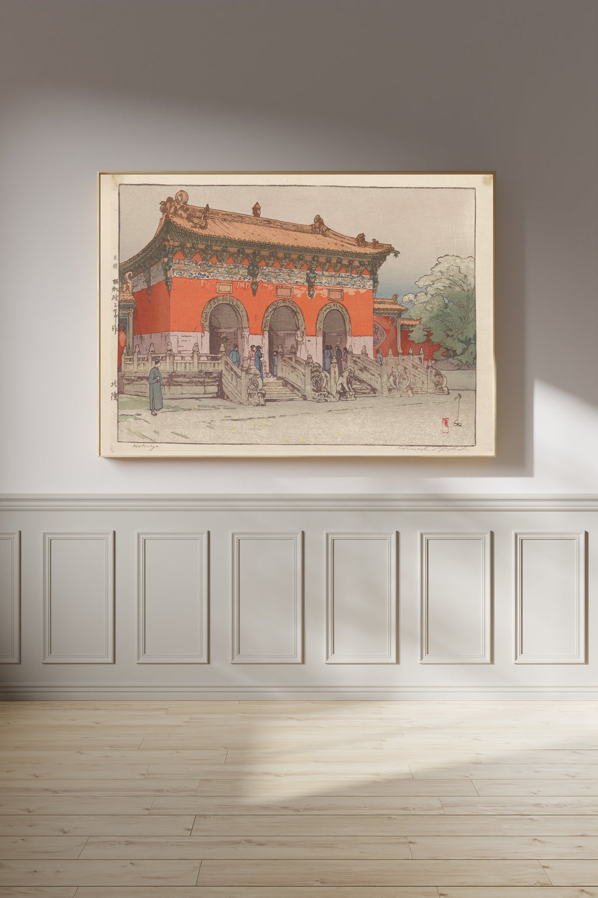 Framed art print of Hokuryo (North Tomb) by Hiroshi Yoshida, on a panelled wall in afternoon light