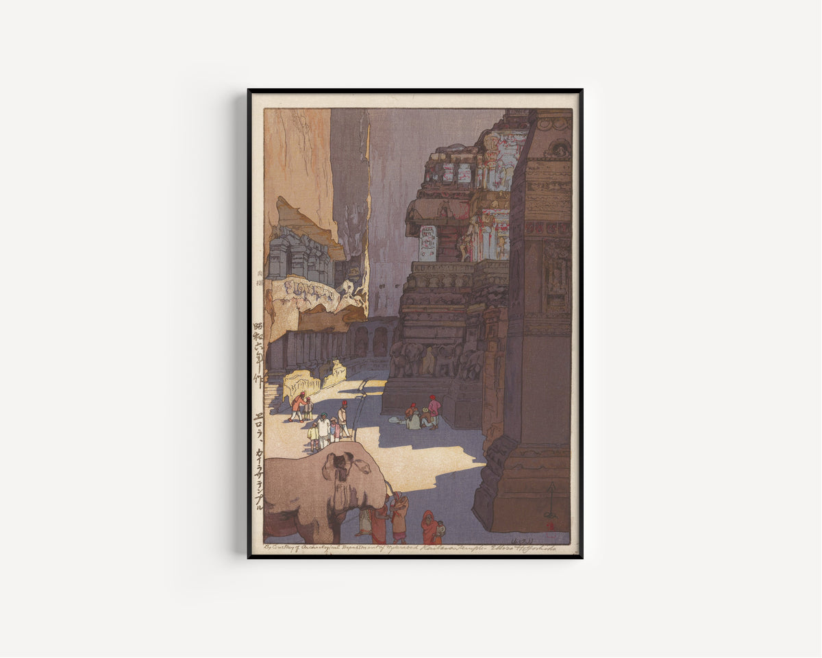Framed art print of Kailasa Temple at Ellora by Hiroshi Yoshida, in a slim black frame on a plain white wall