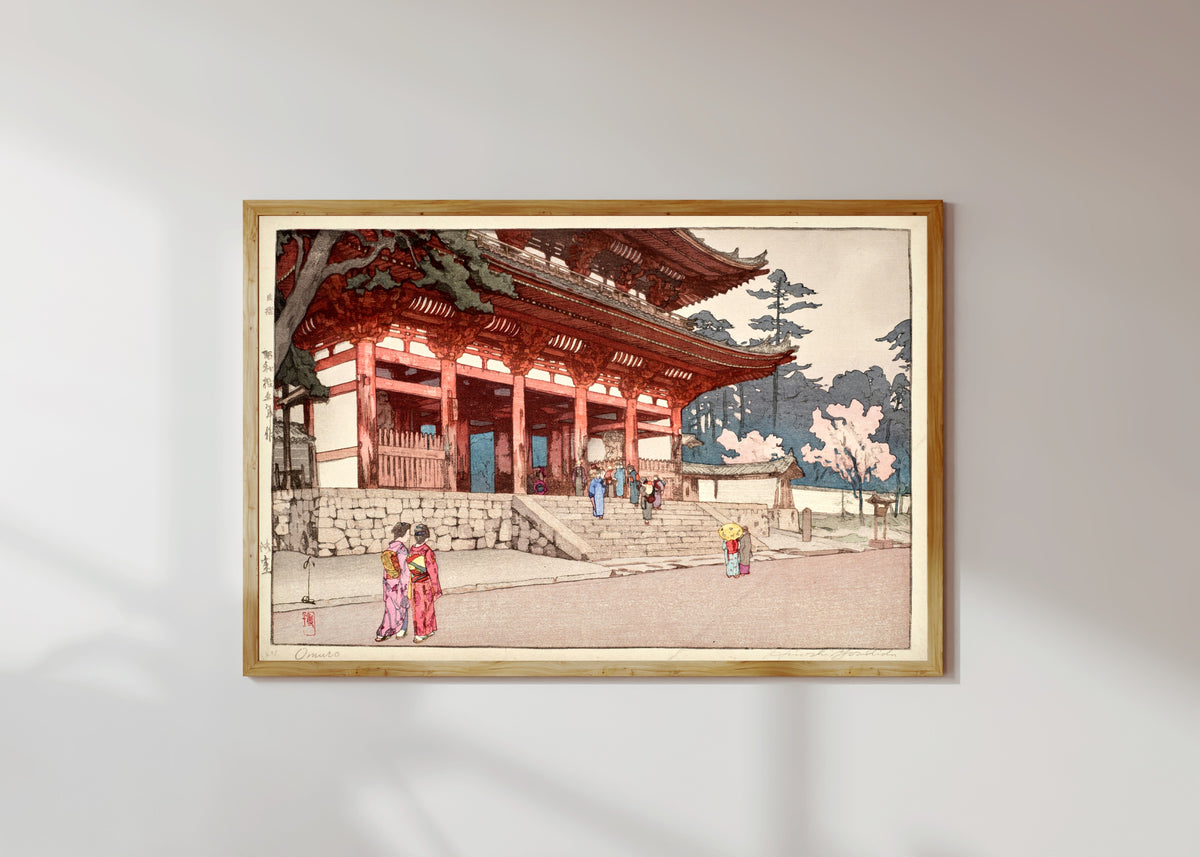 Framed art print of Omuro by Hiroshi Yoshida, in a light wood frame on a sunlit white wall