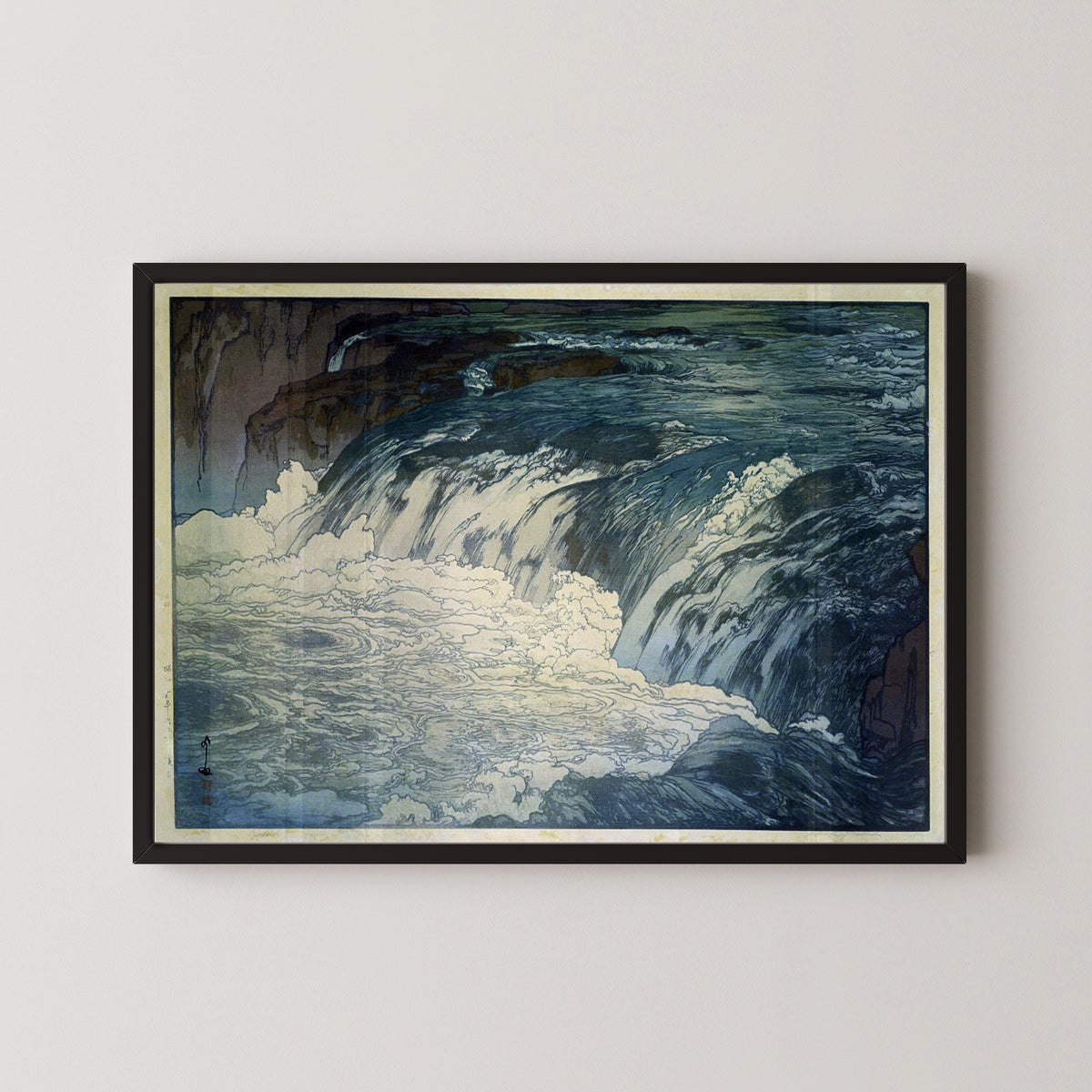 Framed art print of Rapids by Hiroshi Yoshida, in a black frame on a pale wall