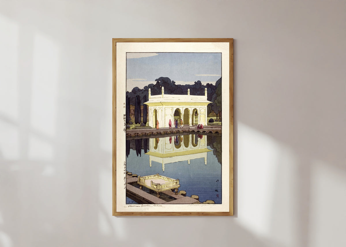 Framed art print of Shalimar Gardens, Lahore by Hiroshi Yoshida, in a light wood frame on a sunlit white wall