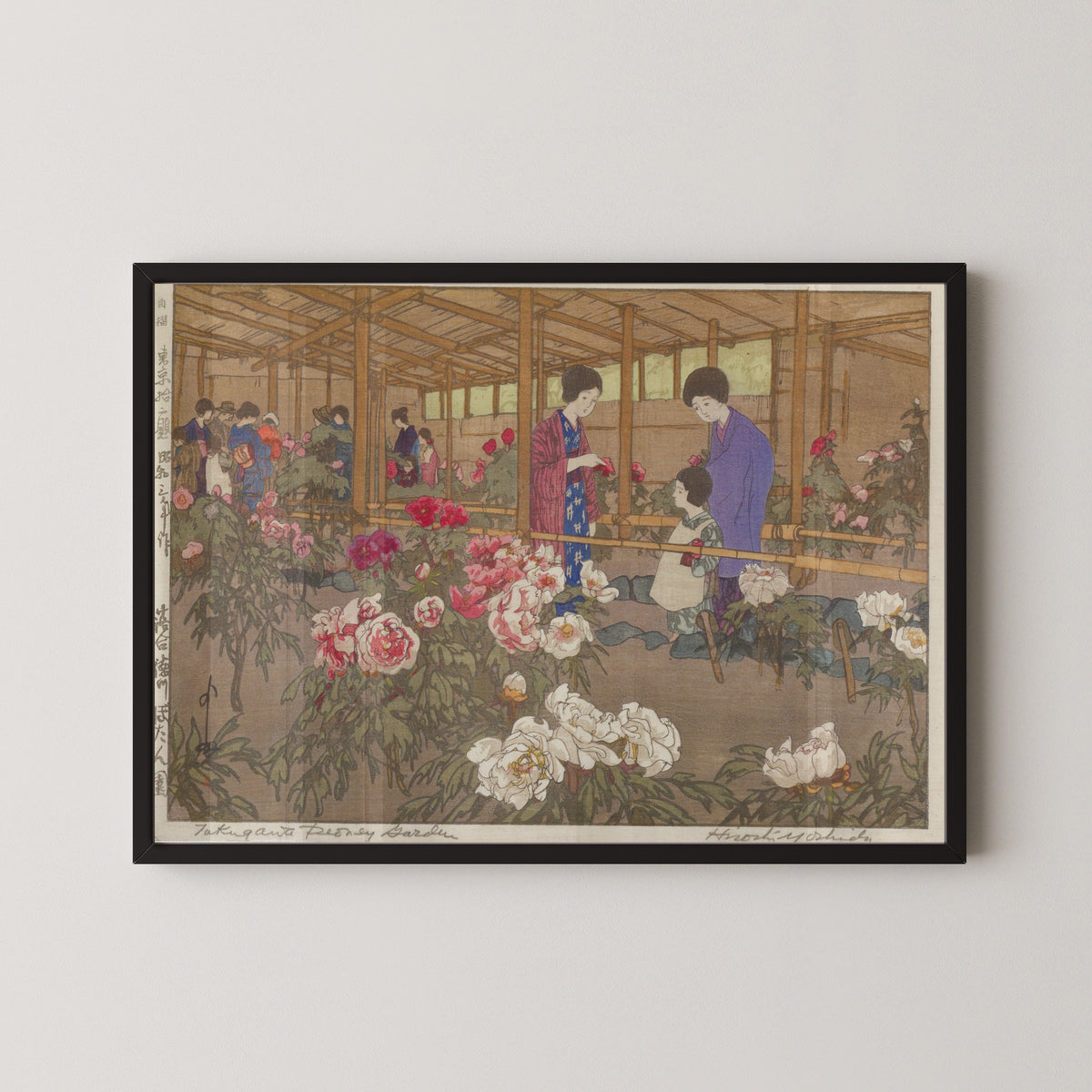 Framed art print of The Tokugawa Peony Garden at Ochiai by Hiroshi Yoshida, in a black frame on a pale wall