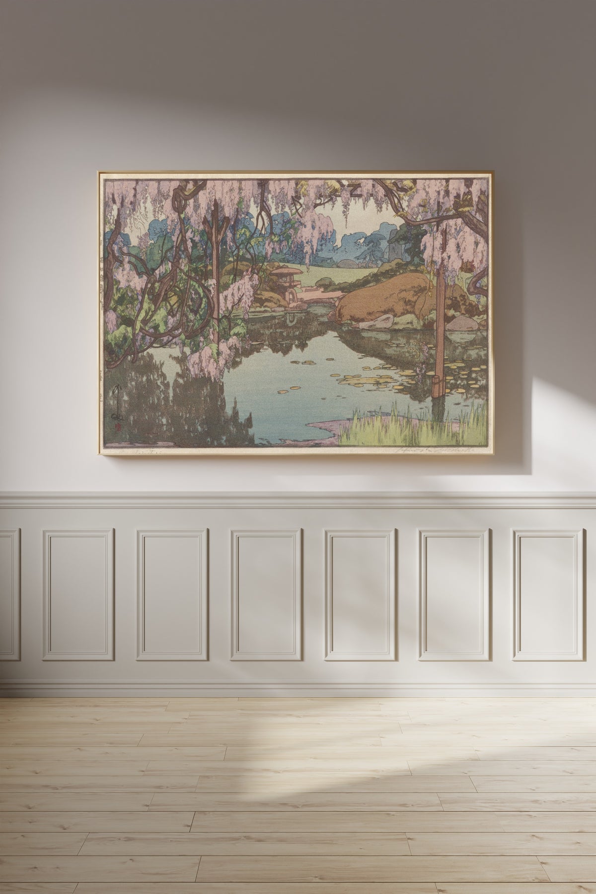 Framed art print of Wisteria Garden by Hiroshi Yoshida, on a panelled wall in afternoon light