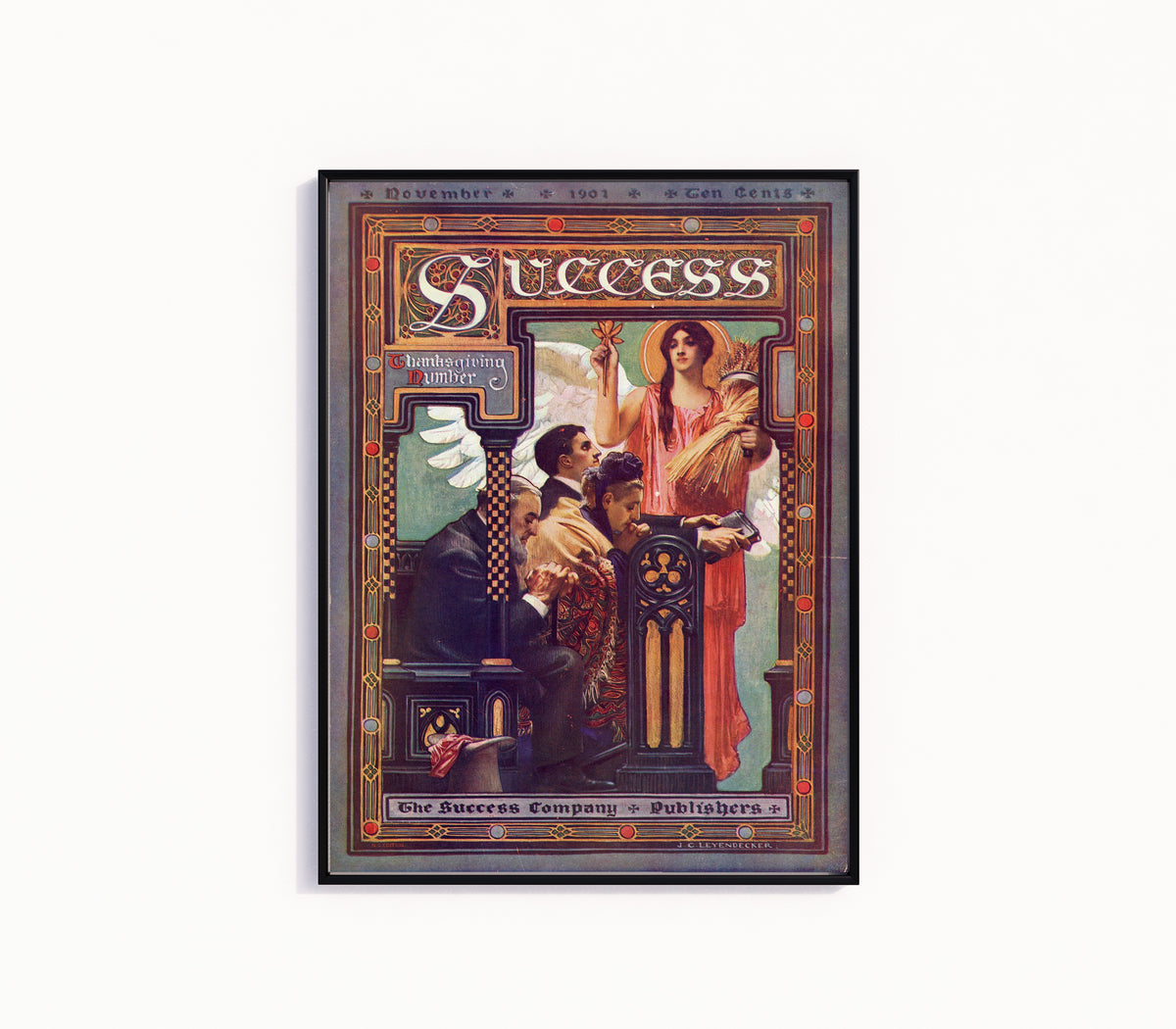 Framed art print of Success, Thanksgiving Number, November 1901 by J.C. Leyendecker, in a slim black frame on a plain white wall