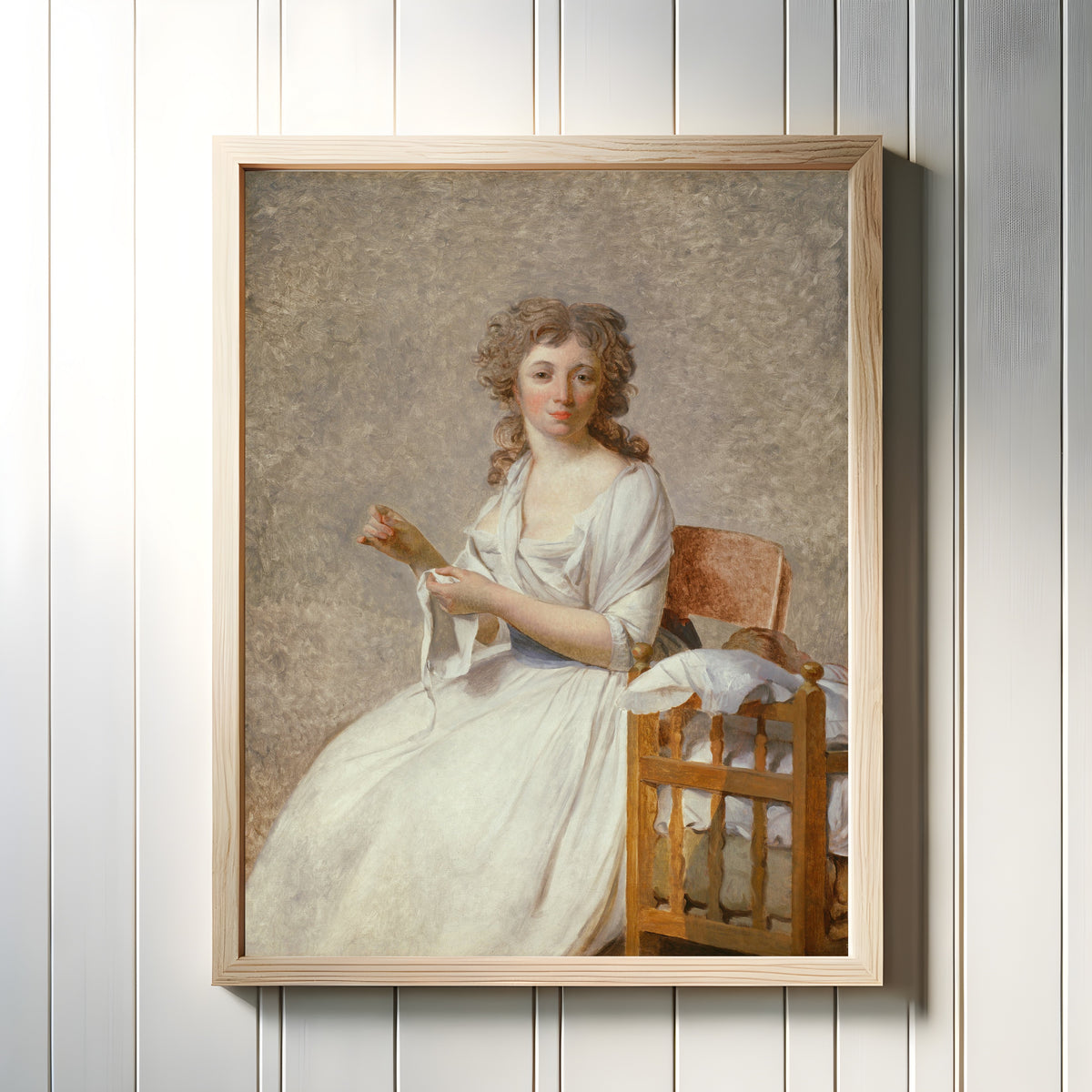 Framed art print of Madame de Pastoret and Her Son by Jacques-Louis David, in a light wood frame on a white panelled wall