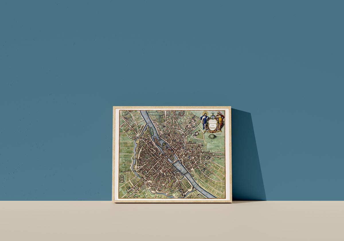 Framed art print of Lutetia Parisiorum vulgo Paris by Jan Janssonius, in a light wood frame leaning on a blue wall