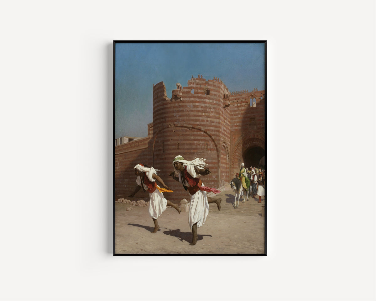 The Runners of the Pasha by Jean-Léon Gérôme — in a slim black frame on a plain white wall